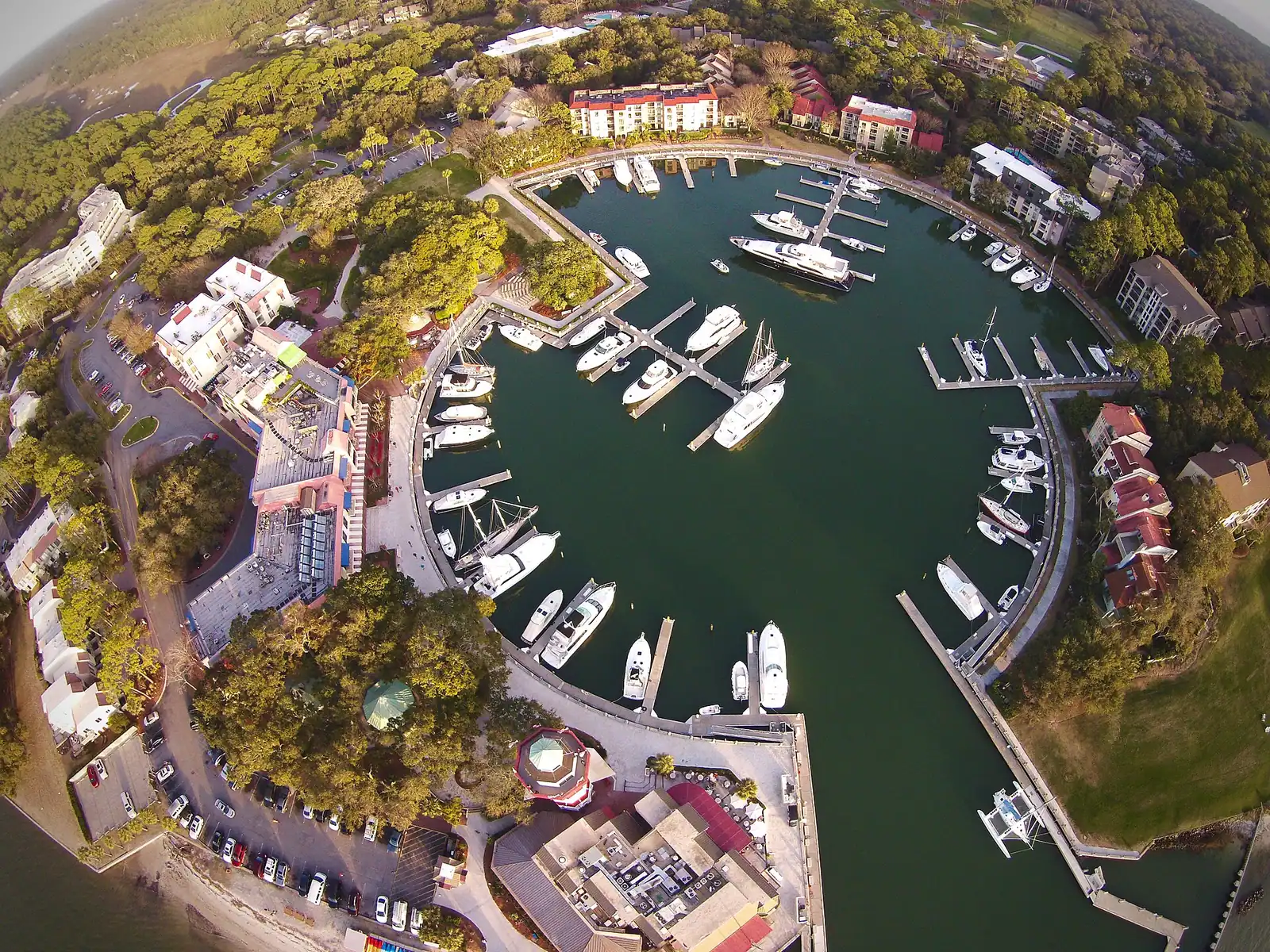 The red and white striped Harbour Town Lighthouse above the yacht basin at Sea Pines, Hilton Head Island